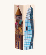 Bajo four towers dragon turning blocks. Three wooden blocks that are attached to each other.  Each side features an illustration of a tower.
