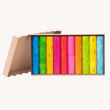 Bajo wooden fractions set early maths learning. Colourful wooden cylinders split into fractions from 1 whole to 1/10 shown in a cardboard packaging box.