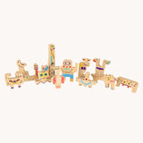 Bajo Friendly Monsters Puzzle and Figures. All the figures have been lined up next to each other. These heirloom quality toys by Bajo are part of a wide range of wooden toys available here at Babipur. 