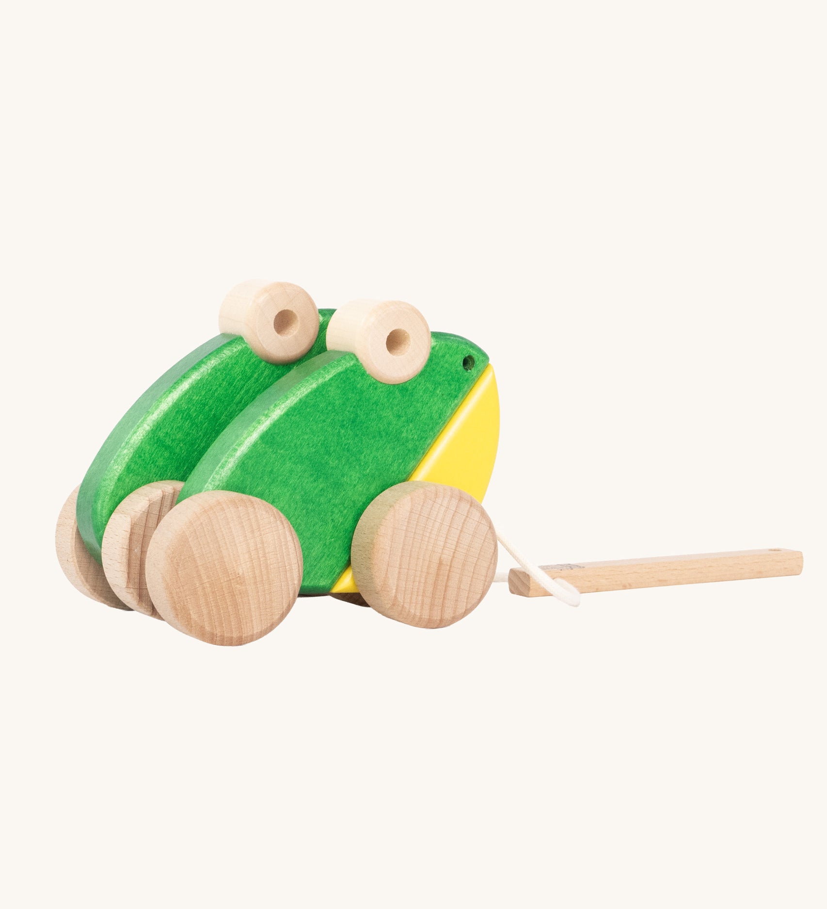 Bajo Green Double Frogs pull along toy. These heirloom quality toys by Bajo are part of a wide range of wooden toys available here at Babipur.