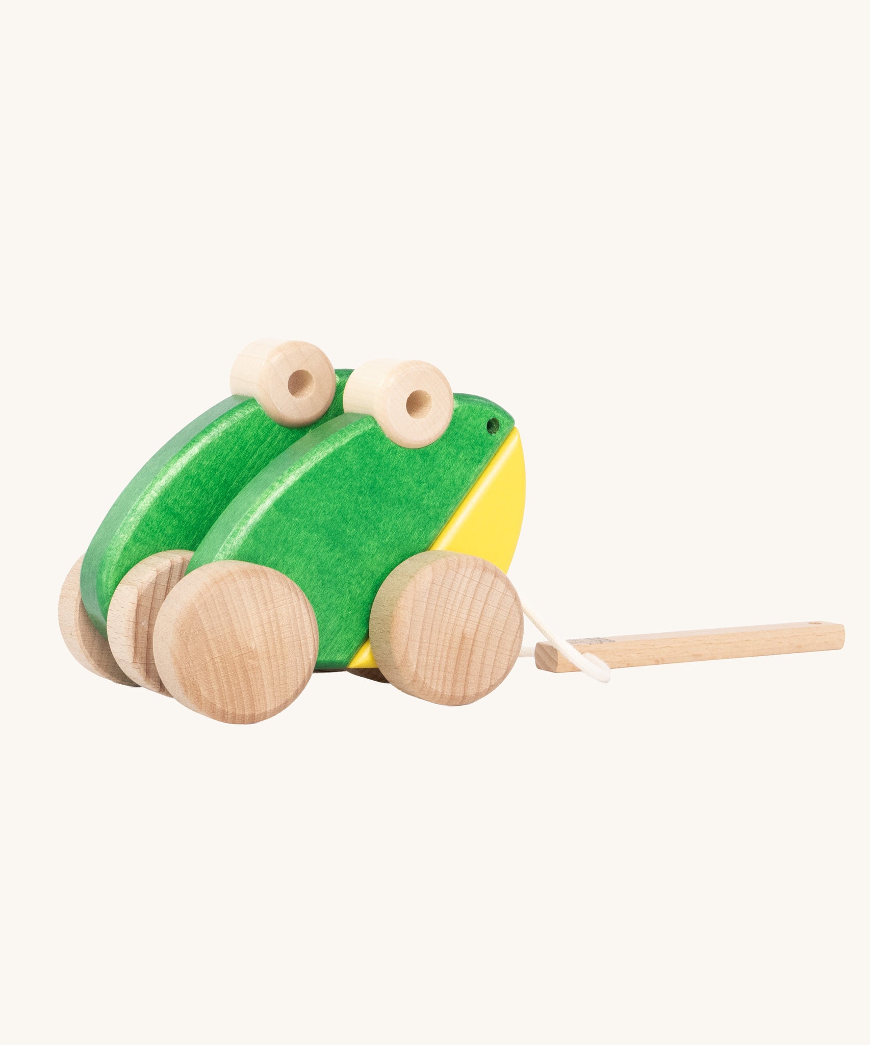 Bajo Green Double Frogs pull along toy. These heirloom quality toys by Bajo are part of a wide range of wooden toys available here at Babipur.