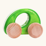 Bajo handmade wooden ellipse car in green with a oval cut out in the center for grip and unpainted wheels