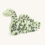 Bajo plastic-free wooden Gruffalo snake figure on a cream background