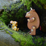 Bajo Gruffalo character wooden toys flatlay featuring Ostheimer play cloths and Babipur Lanka Kade collaboration pieces