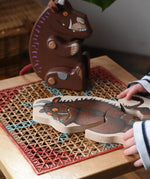 Bajo Gruffalo Character Puzzle placed next to a Gruffalo figure.