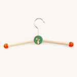 a bajo gruffalo mouse childrens hanger on a cream background