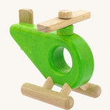 A green Bajo Helicopter wooden toy. This helicopter is part of a large range of wooden toys available here at Babipur. 