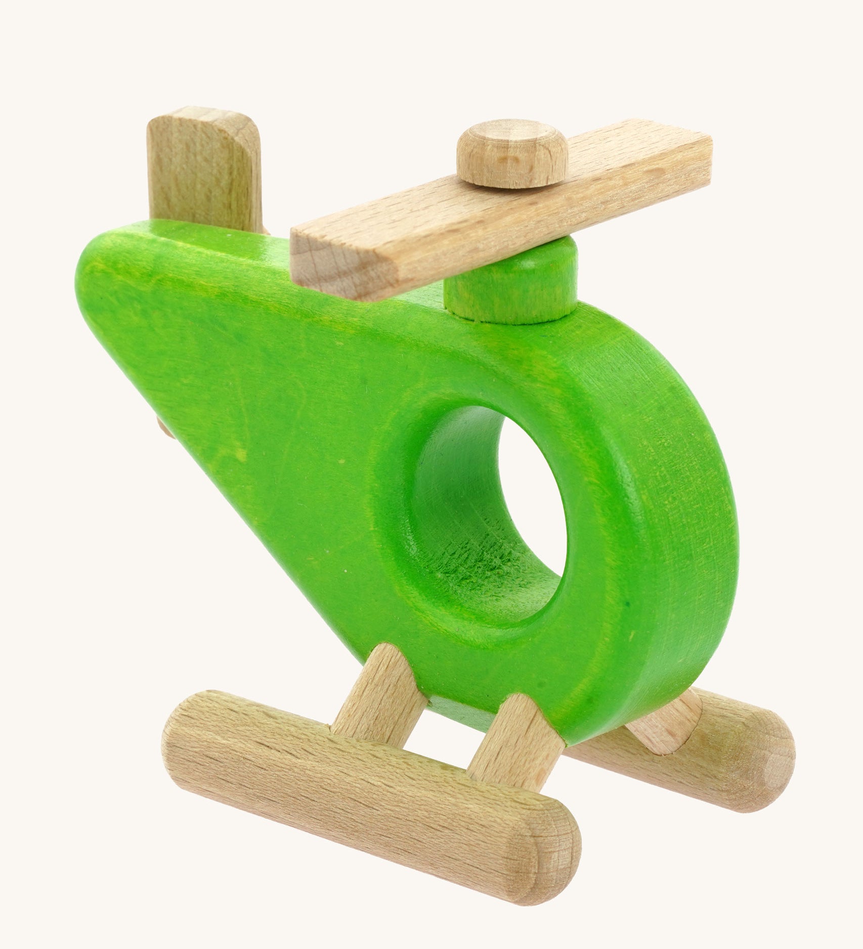 A green Bajo Helicopter wooden toy. This helicopter is part of a large range of wooden toys available here at Babipur. 