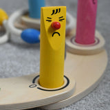 A close up of one of the wooden skittles used in a hoopla set up from the Bajo Fellow Hoopla Game Set. A traditional style wooden game set that can be used for hoopla and skittles. These heirloom quality toys by Bajo are part of a wide range of wooden toys available here at Babipur.