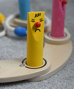 A close up of one of the wooden skittles used in a hoopla set up from the Bajo Fellow Hoopla Game Set. A traditional style wooden game set that can be used for hoopla and skittles. These heirloom quality toys by Bajo are part of a wide range of wooden toys available here at Babipur.