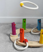 Bajo Fellow Hoopla Game Set. A traditional style wooden game set that can be used for hoopla and skittles. These heirloom quality toys by Bajo are part of a wide range of wooden toys available here at Babipur.