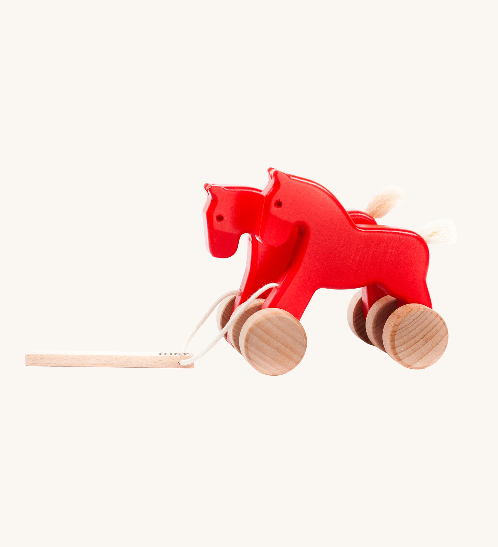 Bajo Red Jumping Horses wooden pull along toy. These heirloom quality toys by Bajo are part of a wide range of wooden toys available here at Babipur.