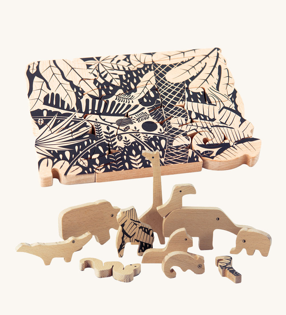 Bajo Jungle Puzzle with a Black print. The animal shaped pieces have been placed in front of a completed puzzle.  These heirloom quality toys by Bajo are part of a wide range of wooden toys available here at Babipur. 