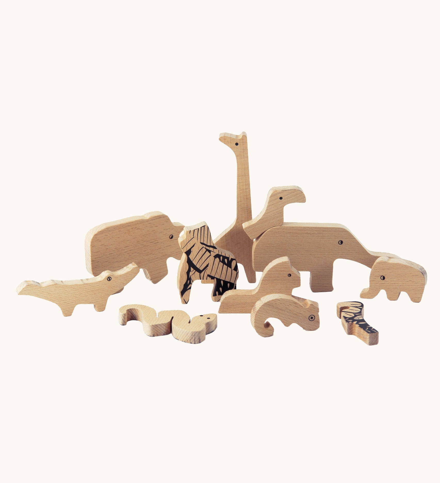Bajo Jungle Puzzle with a Black print. The animal shaped pieces are plain one side and have a black pattern on the other.  These heirloom quality toys by Bajo are part of a wide range of wooden toys available here at Babipur. 