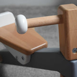 A close up of the handlebar on the Bajo Toys wooden Cycle toddler Ride-On in the monochrome, white and grey colourway. The wooden ride on cycle is part of a wode range of wooden toys available here at Babipur. 