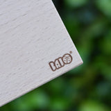 Close up of the logo on the wooden trailer box from the Bajo large truck and trailer wooden toy.