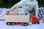 Bajo large truck and trailer wooden toy with Holztiger giraffe and horse placed in the trailer. 