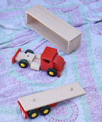Bajo large truck and trailer wooden toy with the cab, trailer base and trailer box separated.  