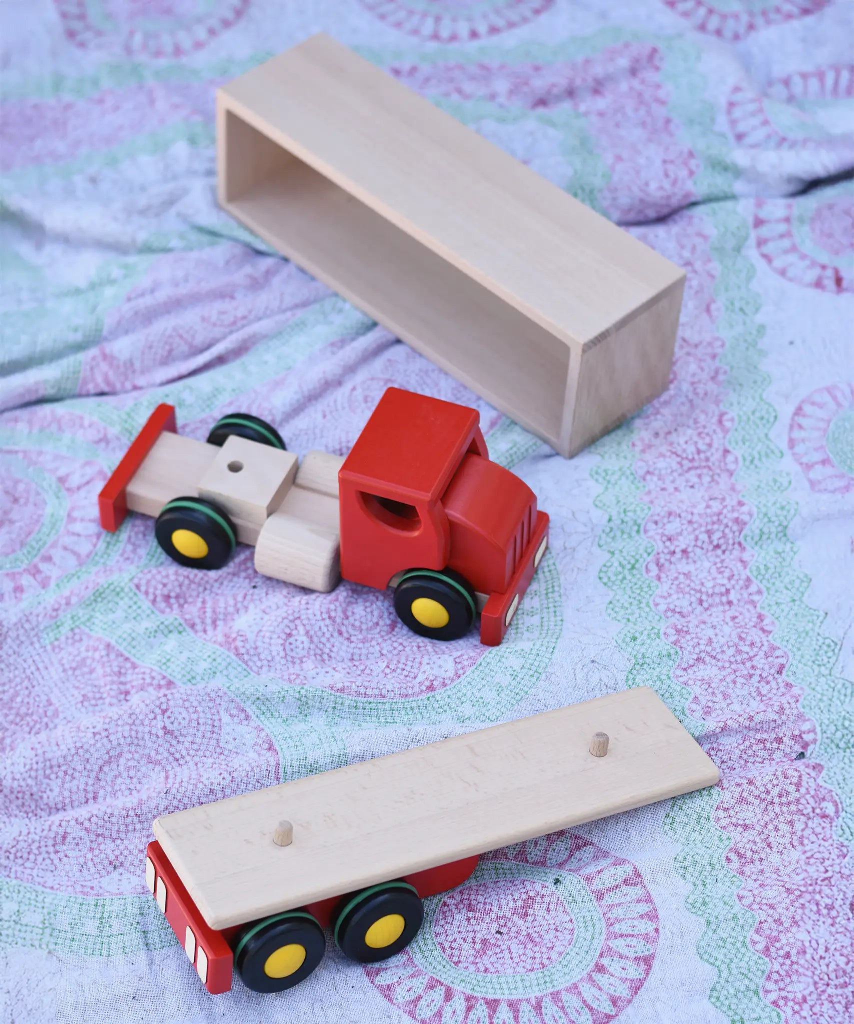 Bajo large truck and trailer wooden toy with the cab, trailer base and trailer box separated.  