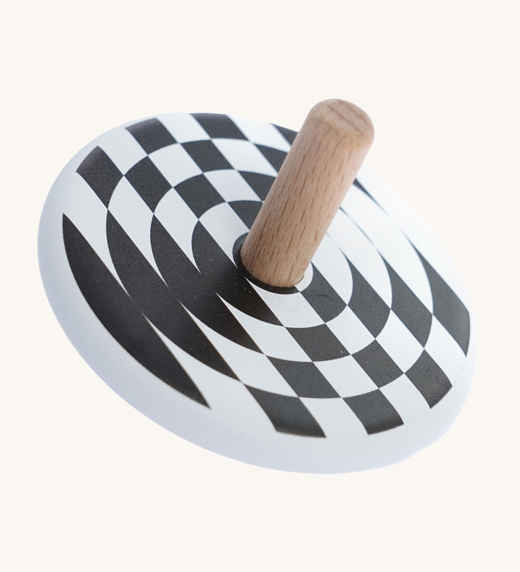 Bajo Latern Spinning Top. A wooden spinning top toy with a black and white monochrome pattern on the top. These heirloom quality toys by Bajo are part of a wide range of wooden toys available here at Babipur.
