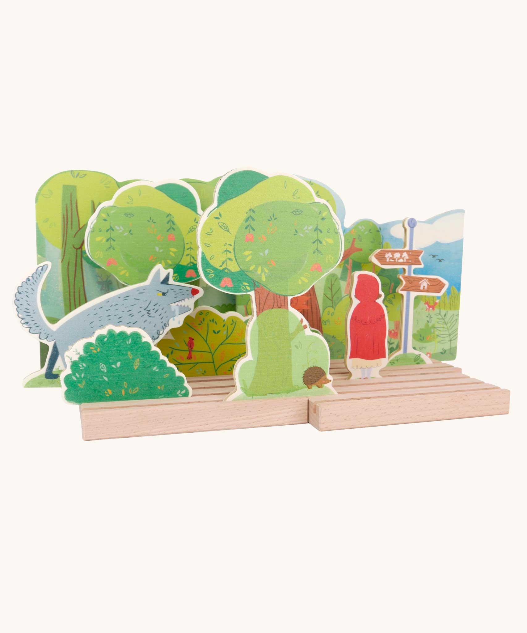 Bajo Little Red Riding Hood Wooden Theatre. The pieces from this set can be placed where desired on the wooden base. Perfect for mall world play and reenactments of a classic story. 
