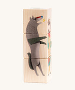 Bajo Little Red Riding Hood Turning Blocks. Three wooden blocks that are attached to each other, each block side features a piece of a character from the little red riding hood than can be twisted to mix and match the character.  These heirloom quality toys by Bajo are part of a wide range of wooden toys available here at Babipur.