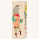 Bajo Little Red Riding Hood Turning Blocks. Three wooden blocks that are attached to each other, each block side features a piece of a character from the little red riding hood than can be twisted to mix and match the character.  These heirloom quality toys by Bajo are part of a wide range of wooden toys available here at Babipur.