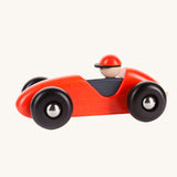 Red Bajo wooden LR car. The car is a part of a wide range of Bajo wooden toy vehicles available at Babipur.
