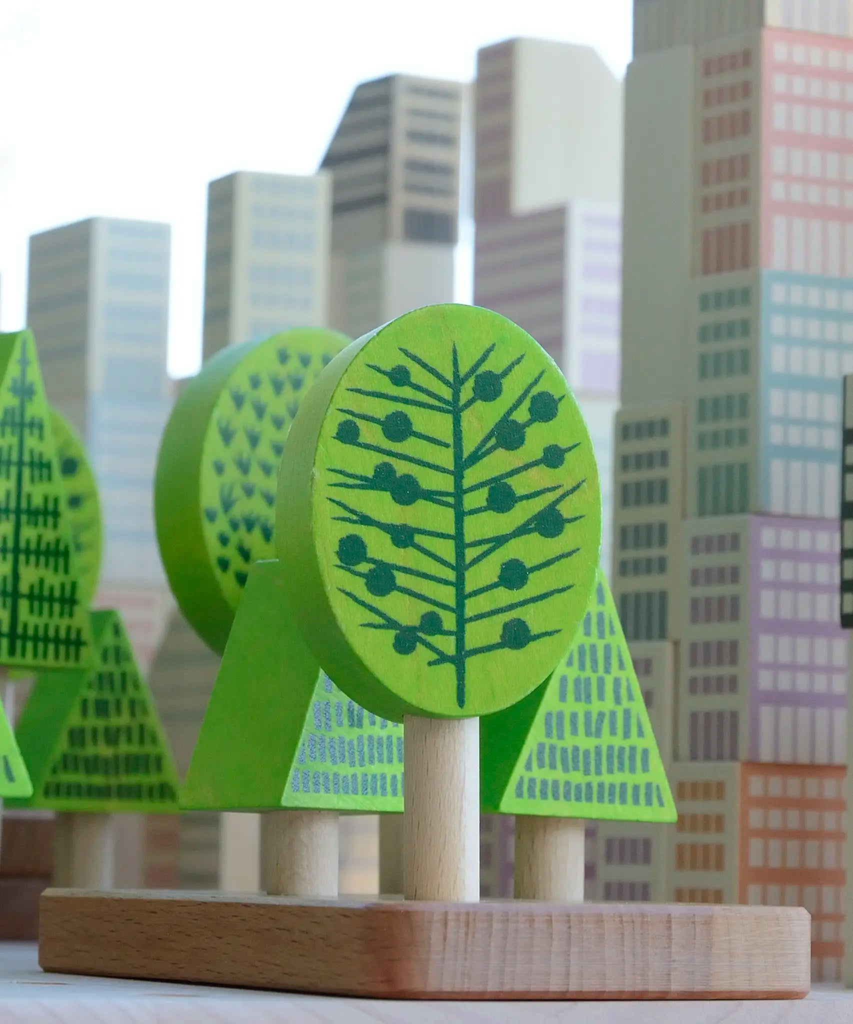 Trees from Bajo's forest central park set with the wooden Manhattan blocks in the background