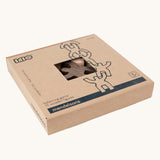 Bajo Mendelsons wooden Balancing Game shown in their cardboard packaging box. A set of 15 wooden figures that can be balanced in various ways.