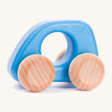 Bajo hand made wooden light blue mini style car available at Babipur. Features unpainted wheels and a cut out hole for easy grabbing