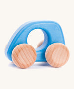 Bajo hand made wooden light blue mini style car available at Babipur. Features unpainted wheels and a cut out hole for easy grabbing