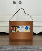 Bajo toys wooden Mondrian building blocks set in their sturdy cardboard packaging box with carry handle.