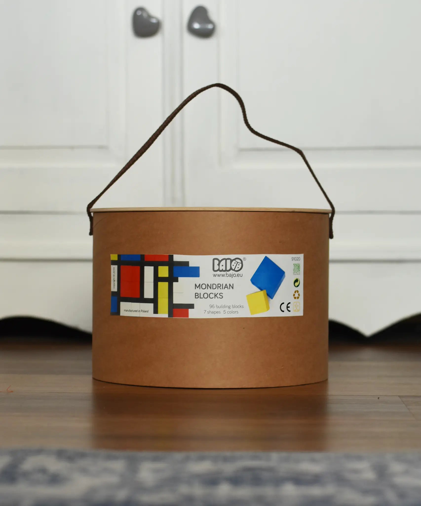 Bajo toys wooden Mondrian building blocks set in their sturdy cardboard packaging box with carry handle.