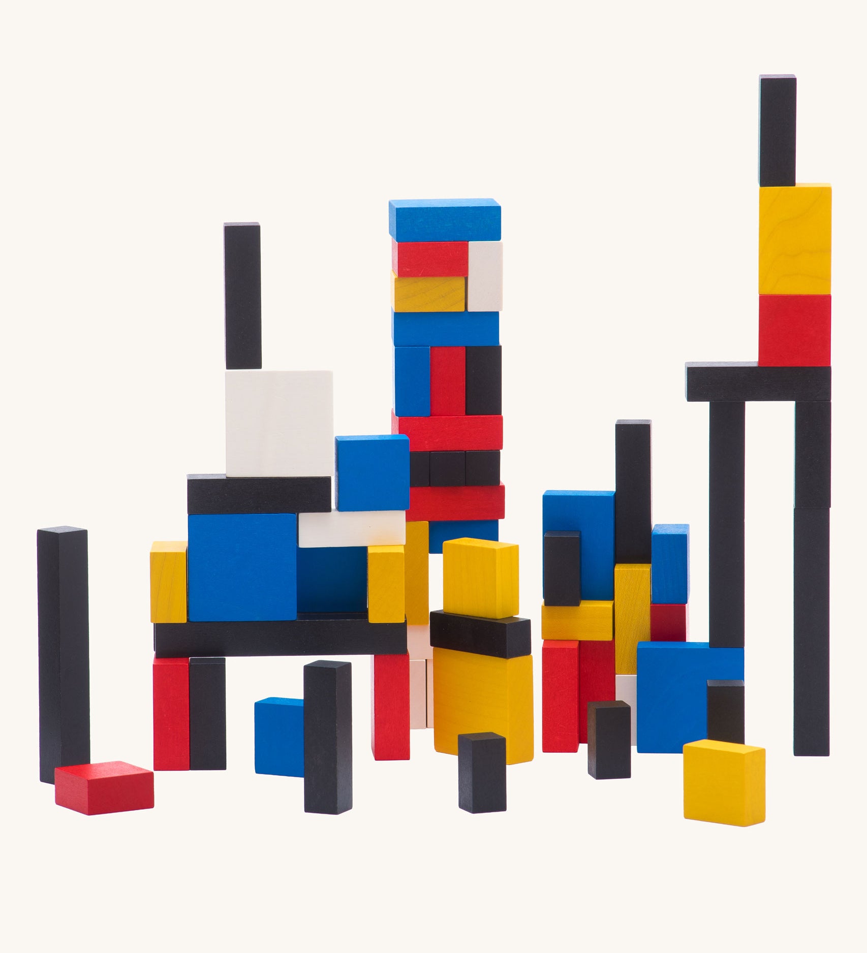 Bajo toys wooden Mondrian Building Blocks. A mix of black, white, yellow, red and blue coloured blocks in a box with square and rectangular shaped blocks.