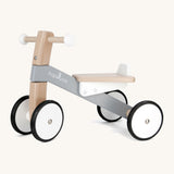 Bajo wooden monochrome cycle ride on bike available at Babipur. Features 2 wheels on the front and back for stability and a wooden seat