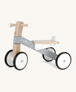 Bajo wooden monochrome cycle ride on bike available at Babipur. Features 2 wheels on the front and back for stability and a wooden seat