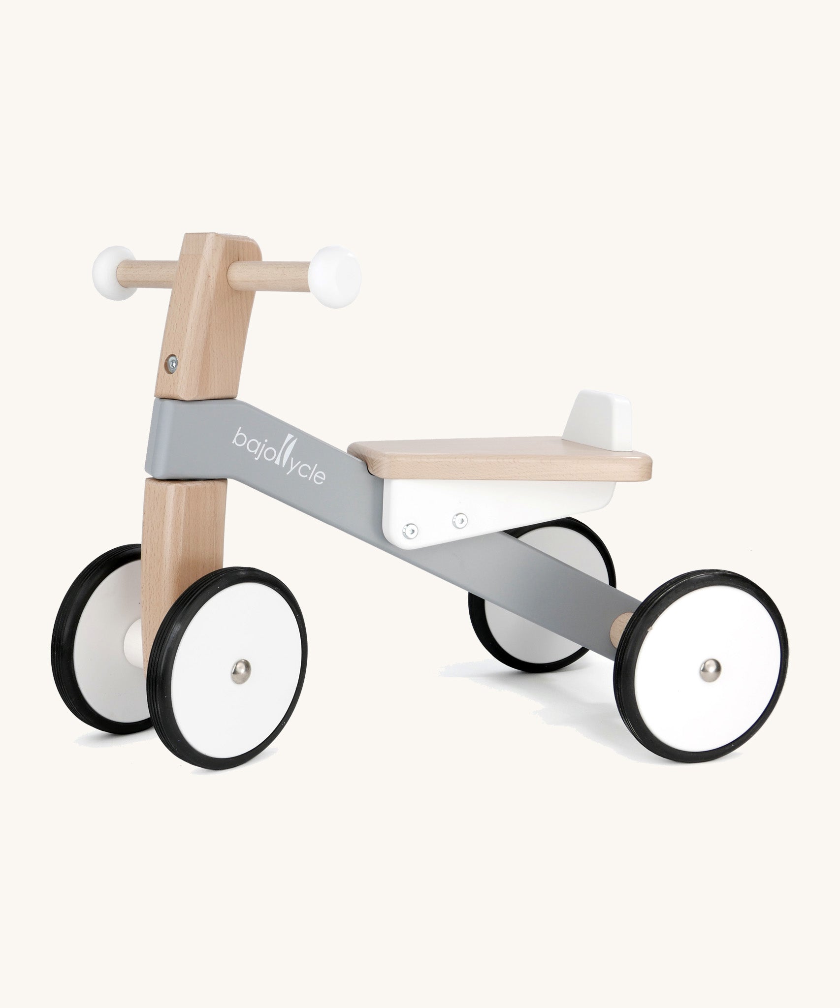 Bajo wooden monochrome cycle ride on bike available at Babipur. Features 2 wheels on the front and back for stability and a wooden seat