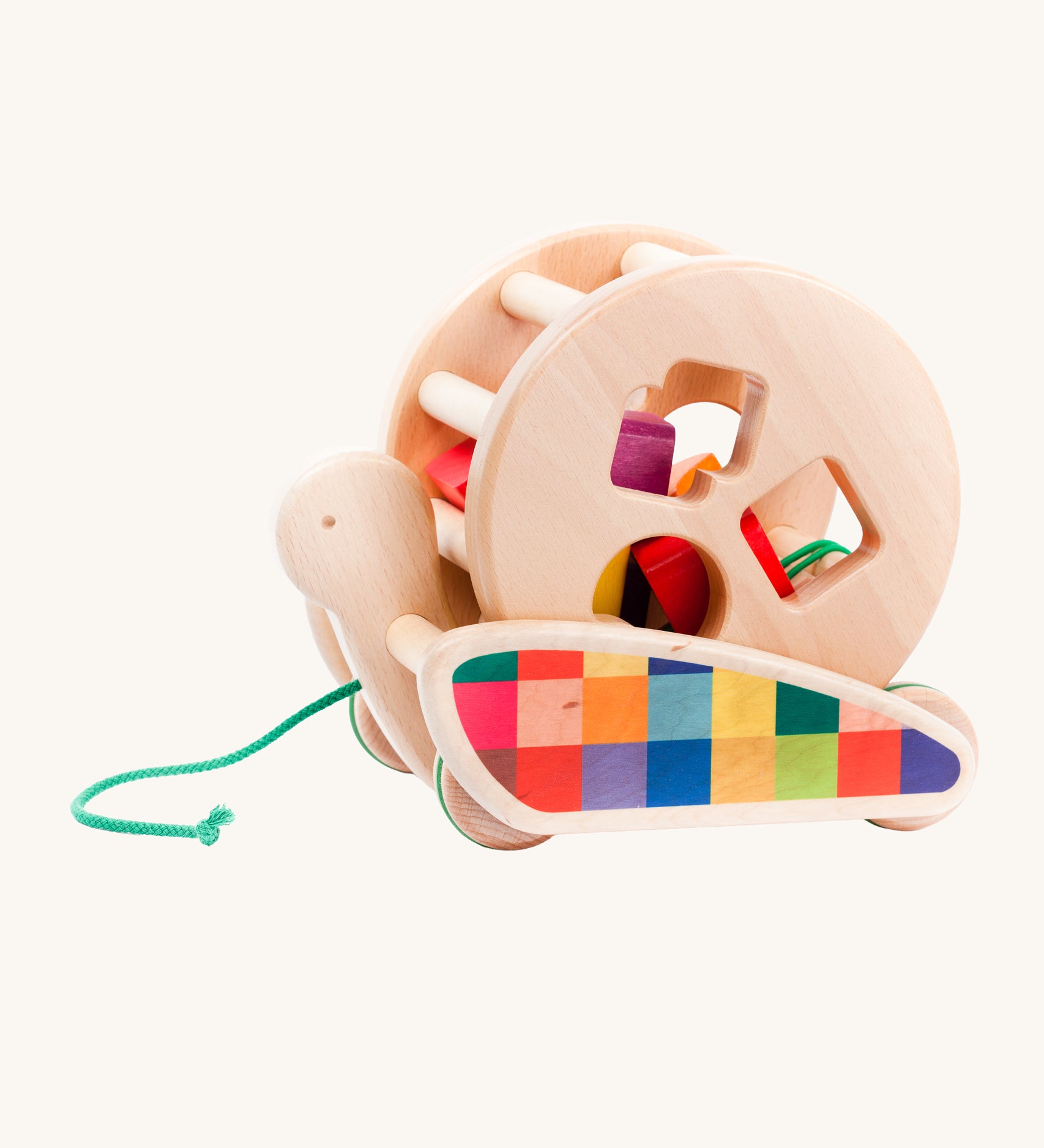 Bajo Natural Snail Sort Roller. A circular shaped wooden roller with coloured shapes that slot through the shaped holes on the side sitting on a pull-along snail. These heirloom quality toys by Bajo are part of a wide range of wooden toys available here at Babipur. 