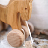 A close up of the Bajo wooden jumping horse showing the detail on the horse's head