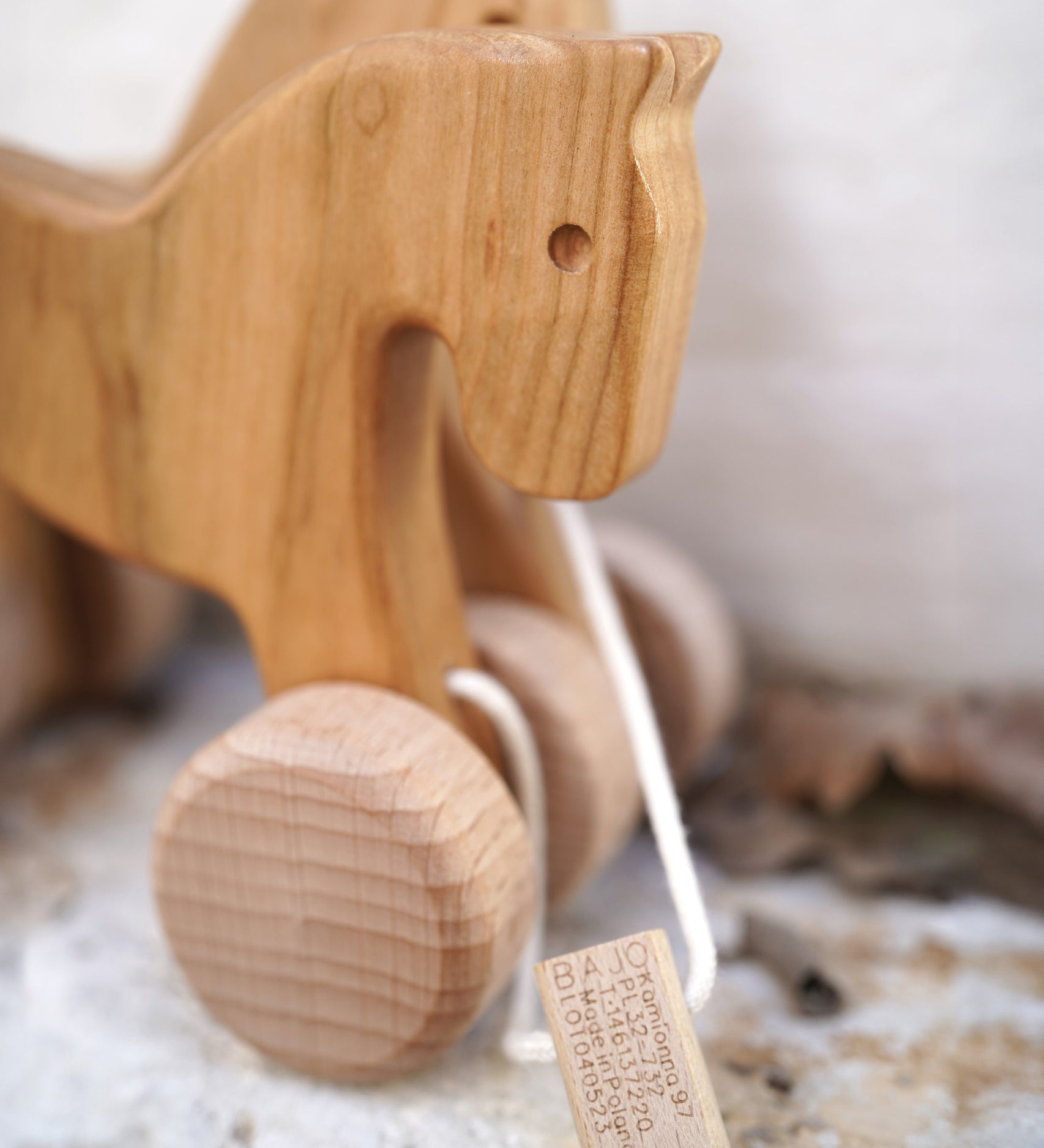 A close up of the Bajo wooden jumping horse showing the detail on the horse's head
