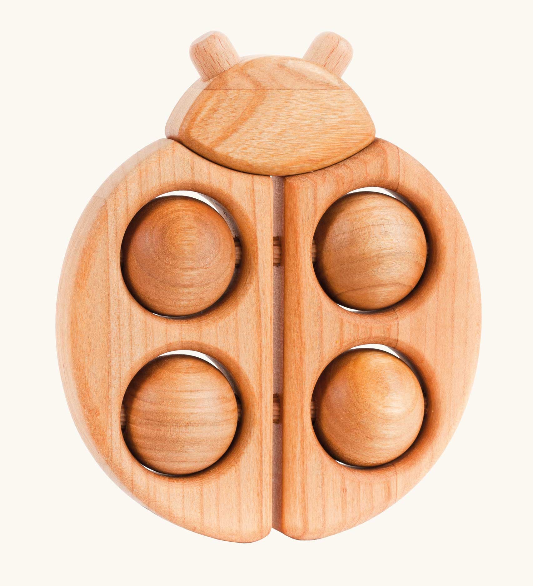 A Bajo Natural wooden Ladybird Teether baby toy. These heirloom quality toys by Bajo are part of a wide range of wooden toys available here at Babipur. 