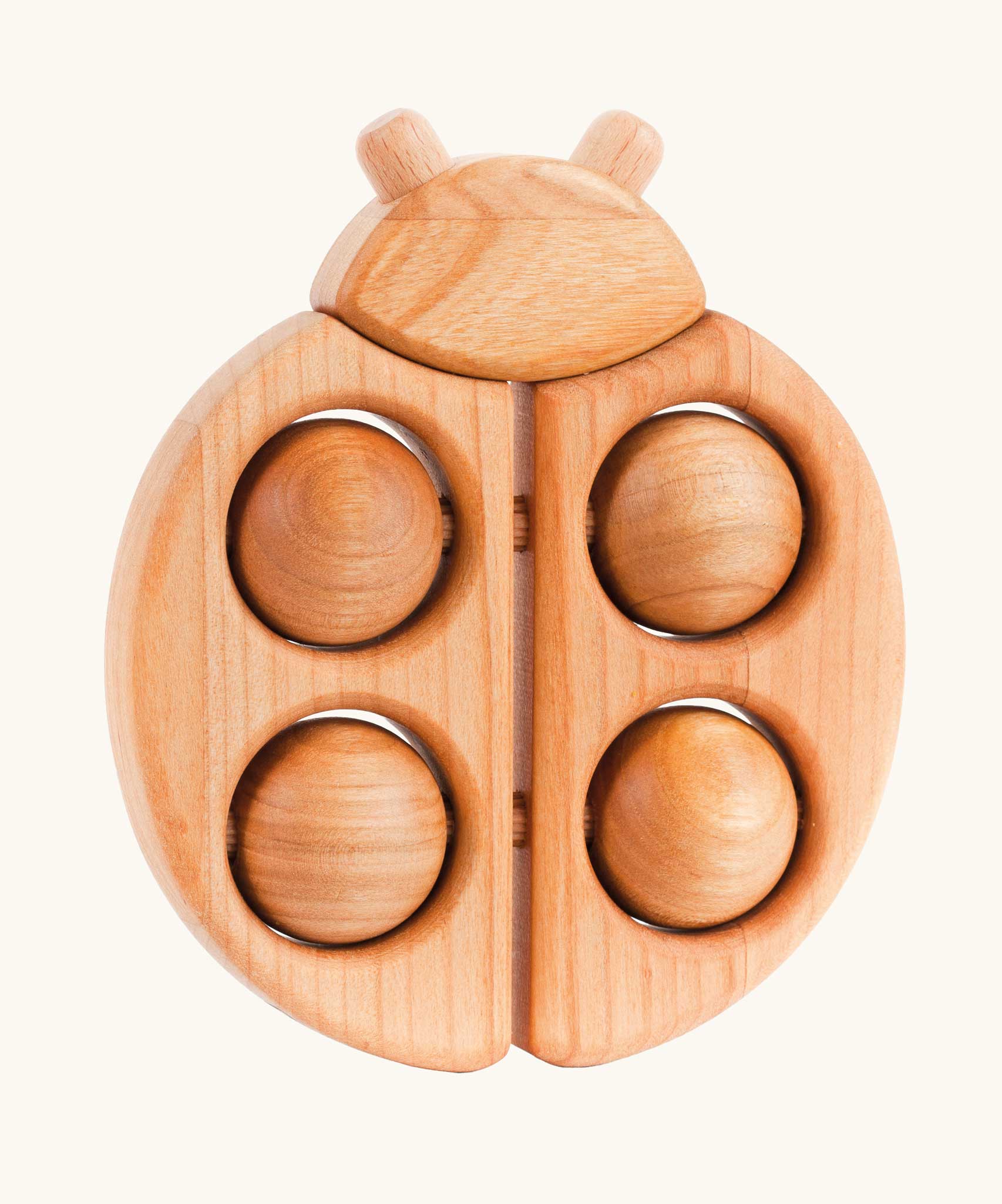 A Bajo Natural wooden Ladybird Teether baby toy. These heirloom quality toys by Bajo are part of a wide range of wooden toys available here at Babipur. 