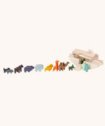 Bajo wooden Noah's ark with wooden coloured animals all lined up outside it. These heirloom quality toys by Bajo are part of a wide range of wooden toys available here at Babipur. 