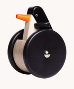 Bajo wobbling penguin push along wooden toy. This toy penguin has large black wheels. These heirloom quality toys by Bajo are part of a wide range of wooden toys available here at Babipur. 