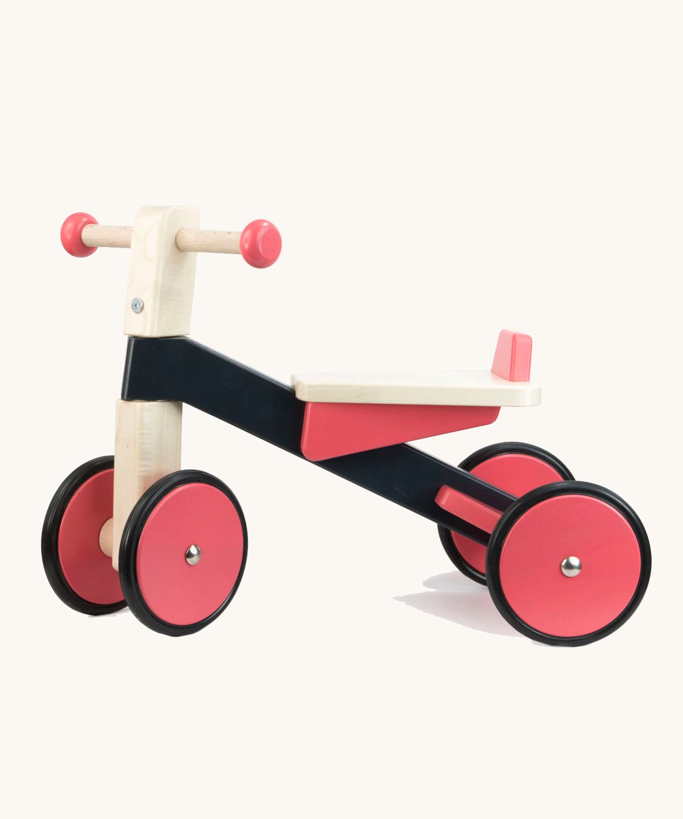 Bajo wooden pink cycle ride on bike available at Babipur. Features 2 wheels on the front and back for stability and a wooden seat