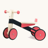 Bajo wooden pink cycle ride on bike available at Babipur. Features 2 wheels on the front and back for stability and a wooden seat