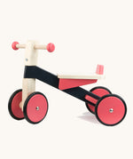 Bajo wooden pink cycle ride on bike available at Babipur. Features 2 wheels on the front and back for stability and a wooden seat