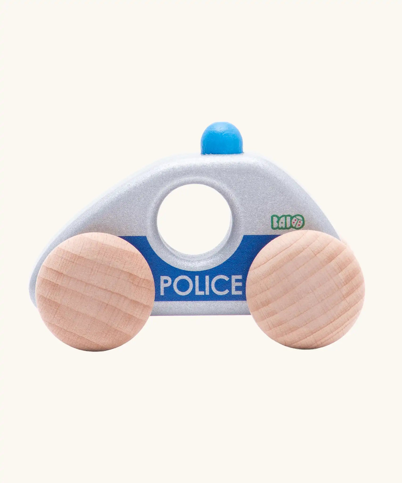 Side profile view of Bajo silver police car wooden toy vehicle. Silver car with blue details and natural wooden wheels.