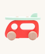 Bajo Camper Van With Surf Board wooden toy vehicle. This red camper van toy comes with a green coloured surf board that sits on the roof. 
These heirloom quality toys by Bajo are part of a wide range of wooden toys available here at Babipur. 
